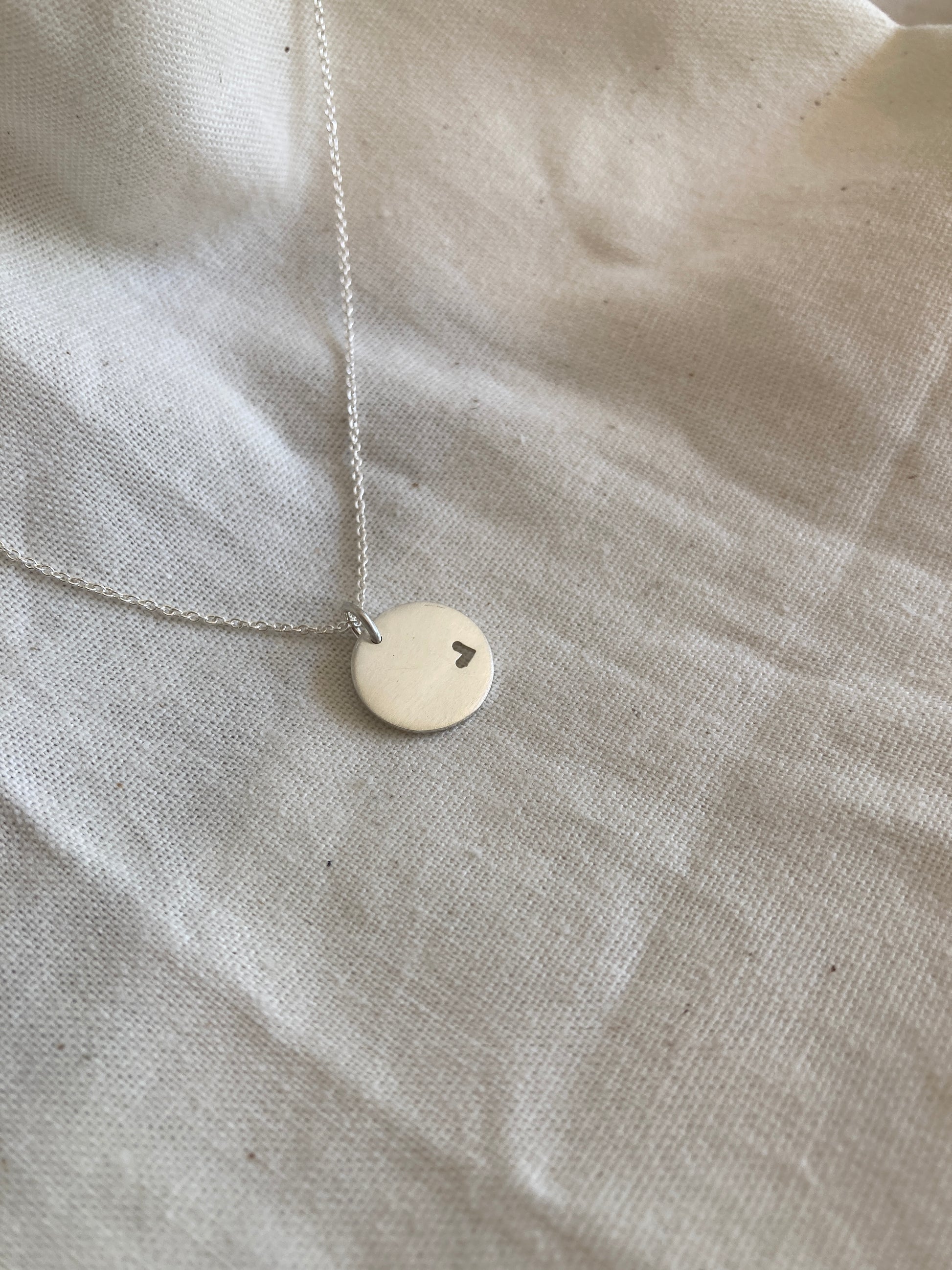 Sterling Silver 13mm Disc Pendant with cut out Heart on Sterling Silver Chain