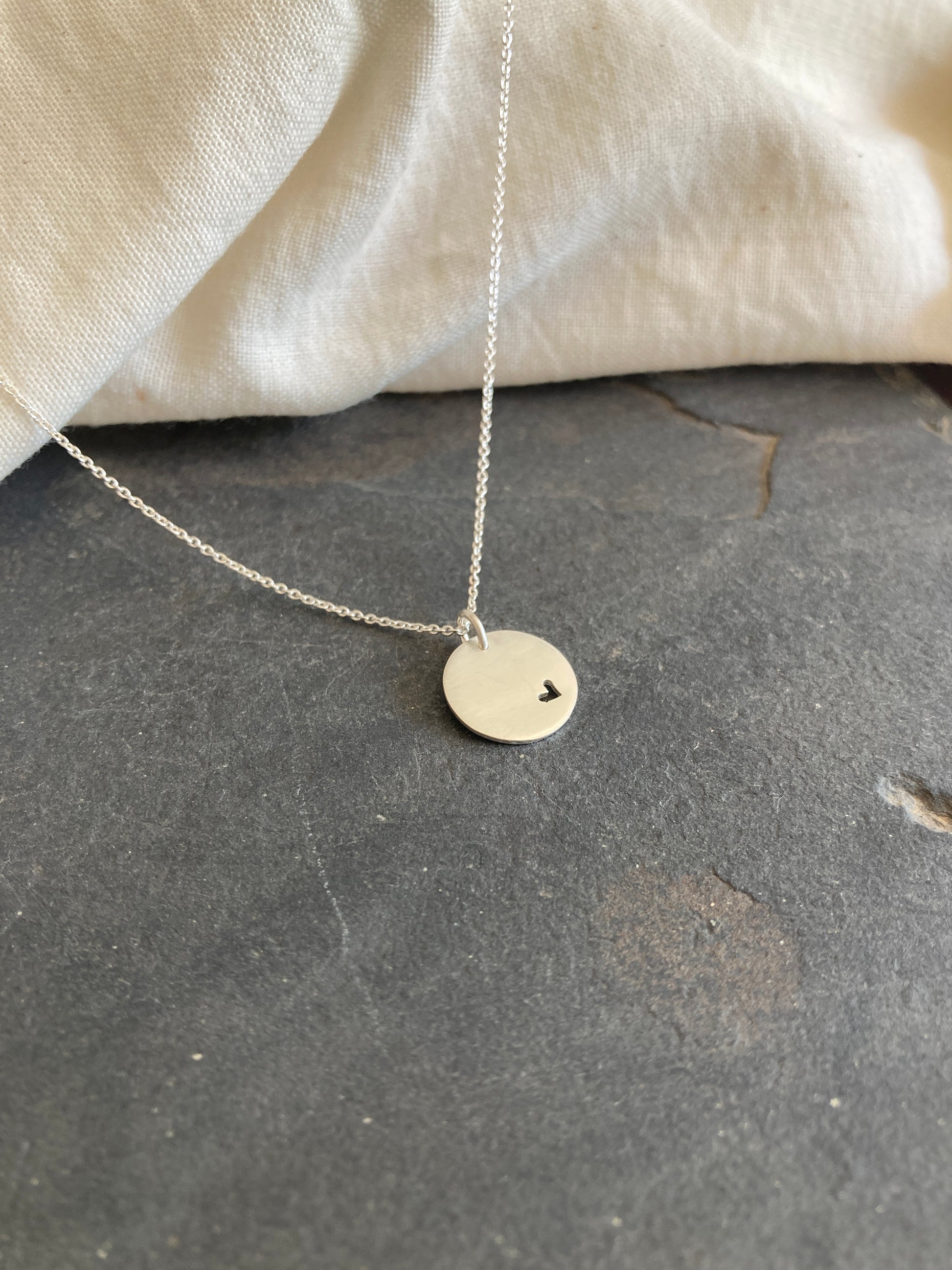 Sterling Silver 13mm Disc Pendant with cut out Heart on Sterling Silver Chain