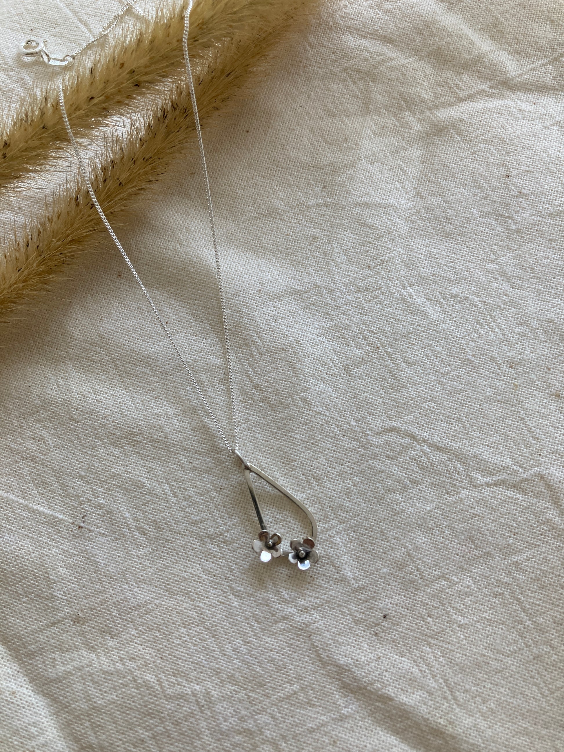 Sterling Silver Teardrop with two small flowers in Bloom Pendant on Sterling Silver Chain