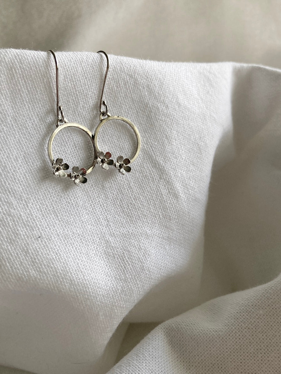 Sterling Silver Circle with two small Blooming Flowers on Silver Hook Earrings