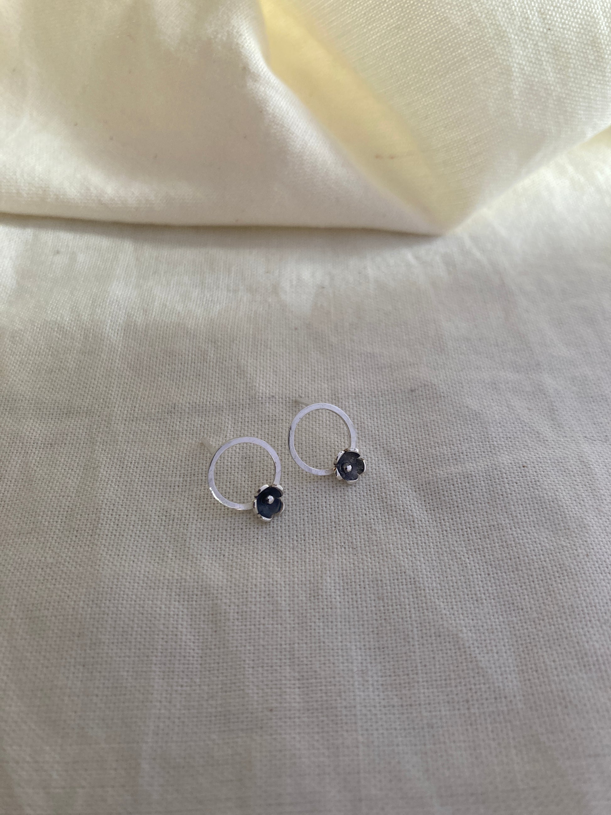 Sterling Silver Circle with one small Blooming Flower Stud Earrings