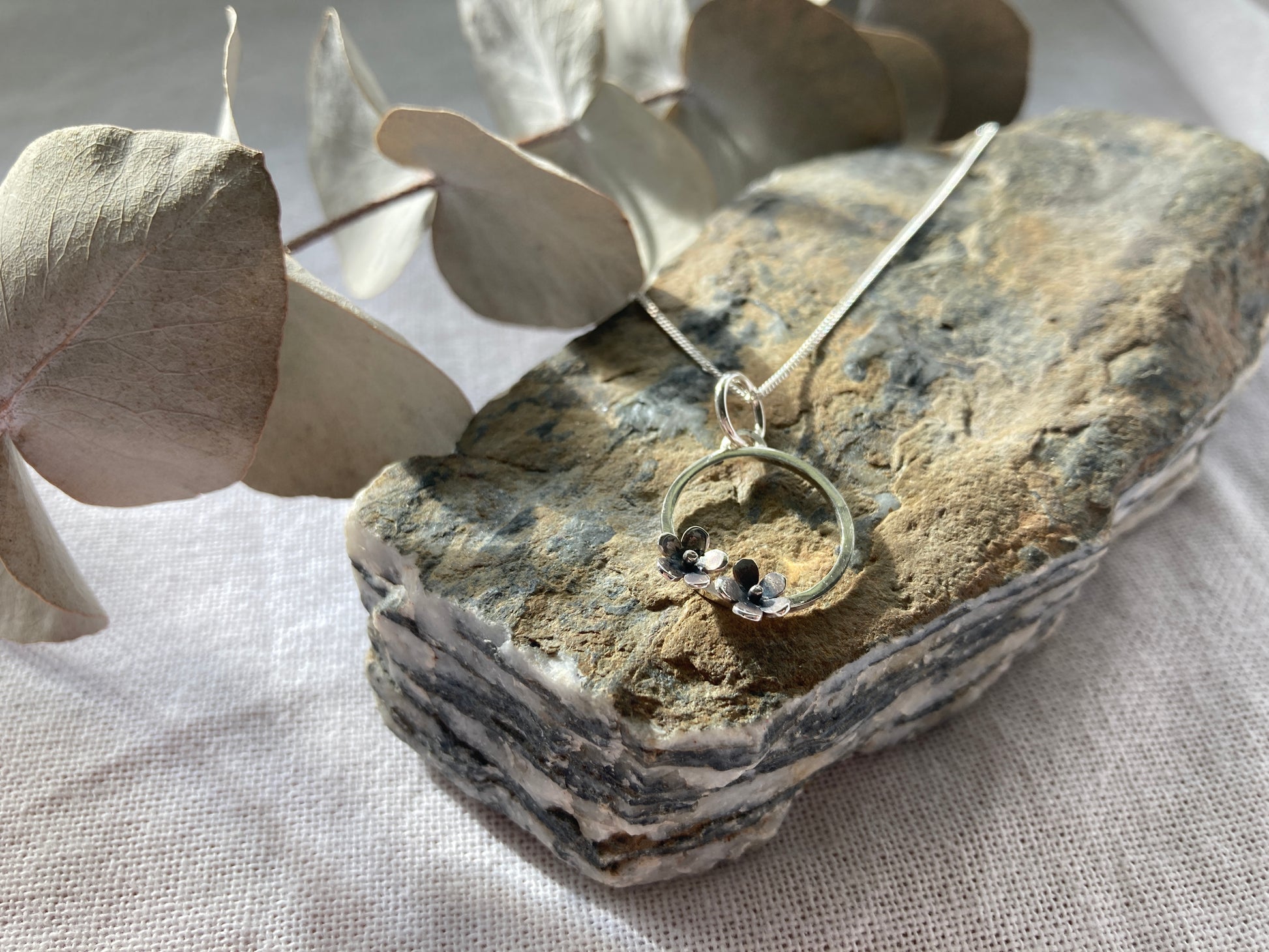 Sterling Silver Circle with two small Blooming Flowers Pendant on Silver Chain