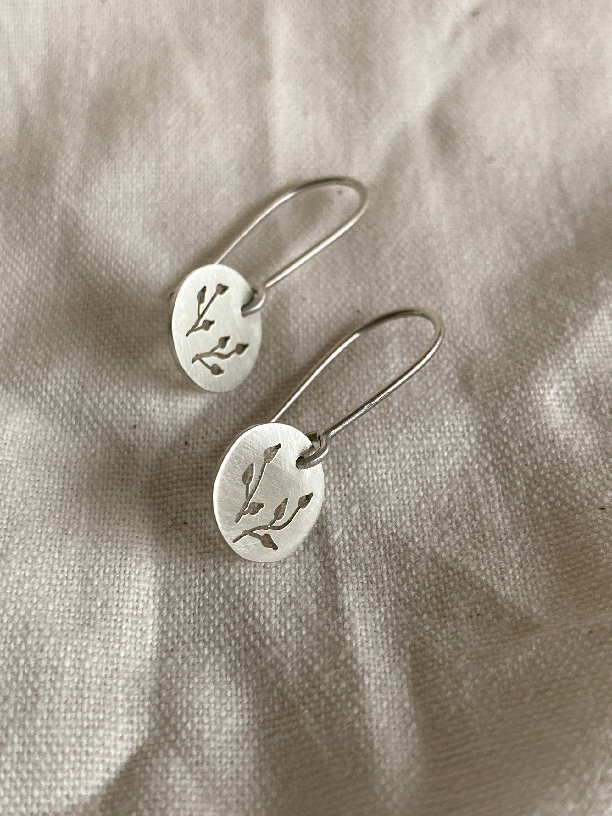 Sterling Silver Discs with Botanical cut-out on Silver Hooks