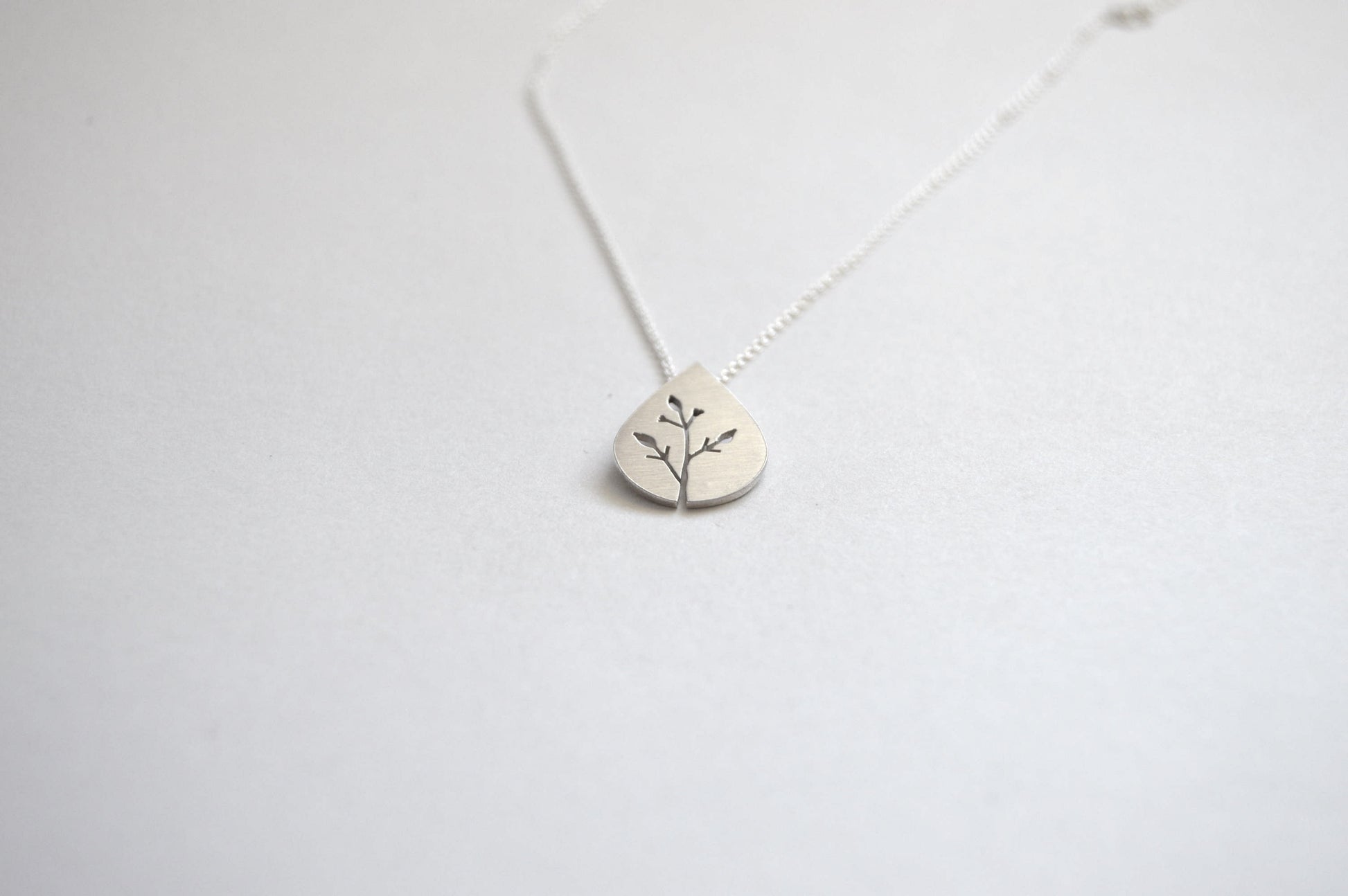 Sterling Silver Teardrop Pendant with Botanical cut out design