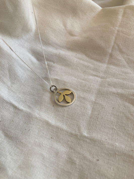 Sterling Silver Circle With Brass Leaves Pendant on Sterling Silver Chain