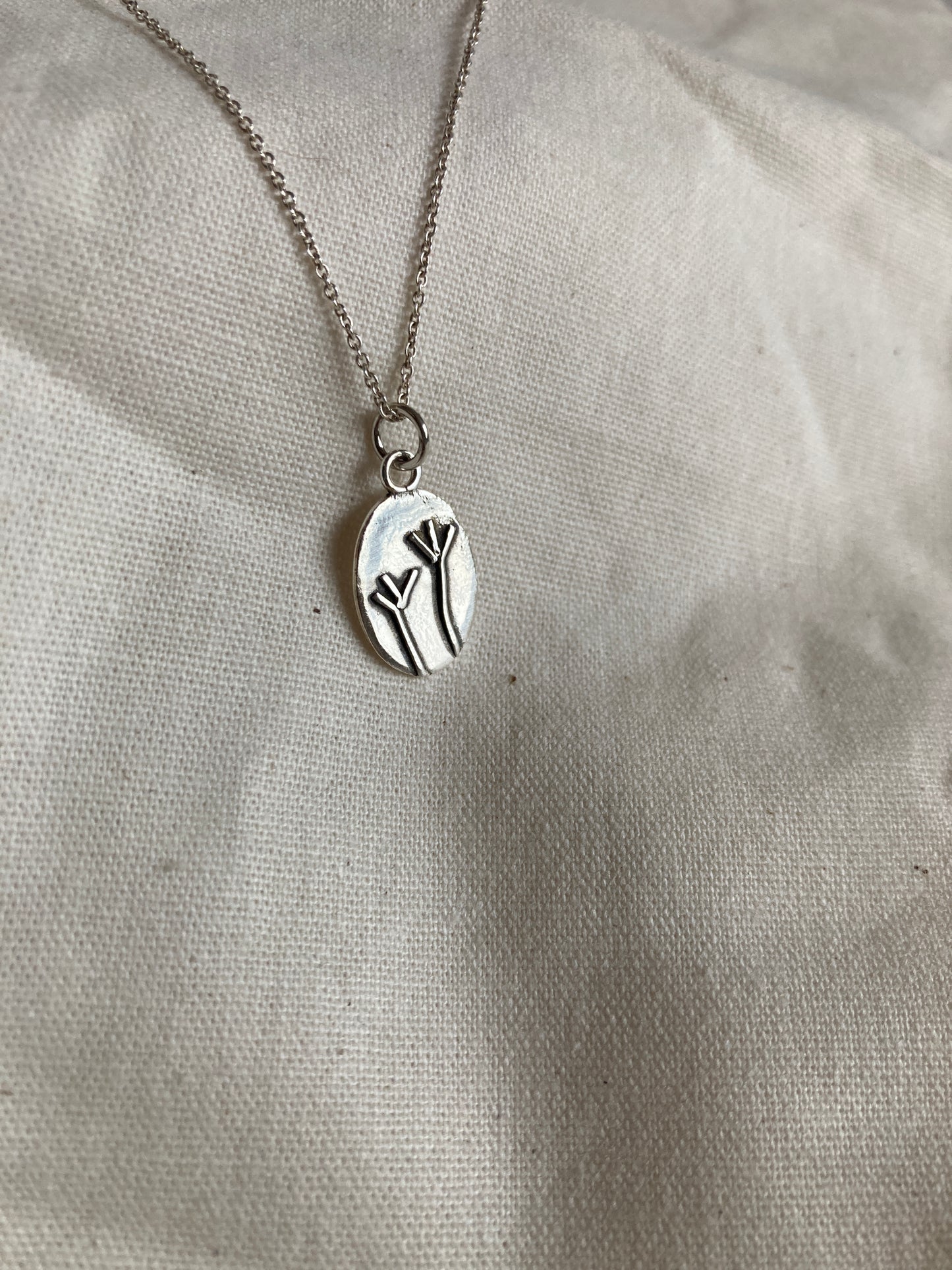 Sterling Silver Oval Pendant with Grass Reed Design on Sterling Silver Chain