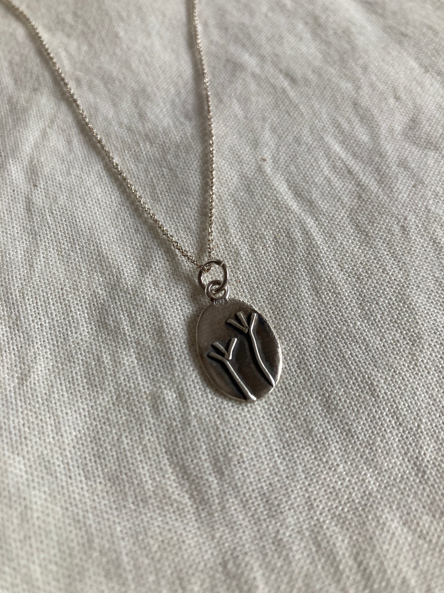 Sterling Silver Oval Pendant with Grass Reed Design on Sterling Silver Chain