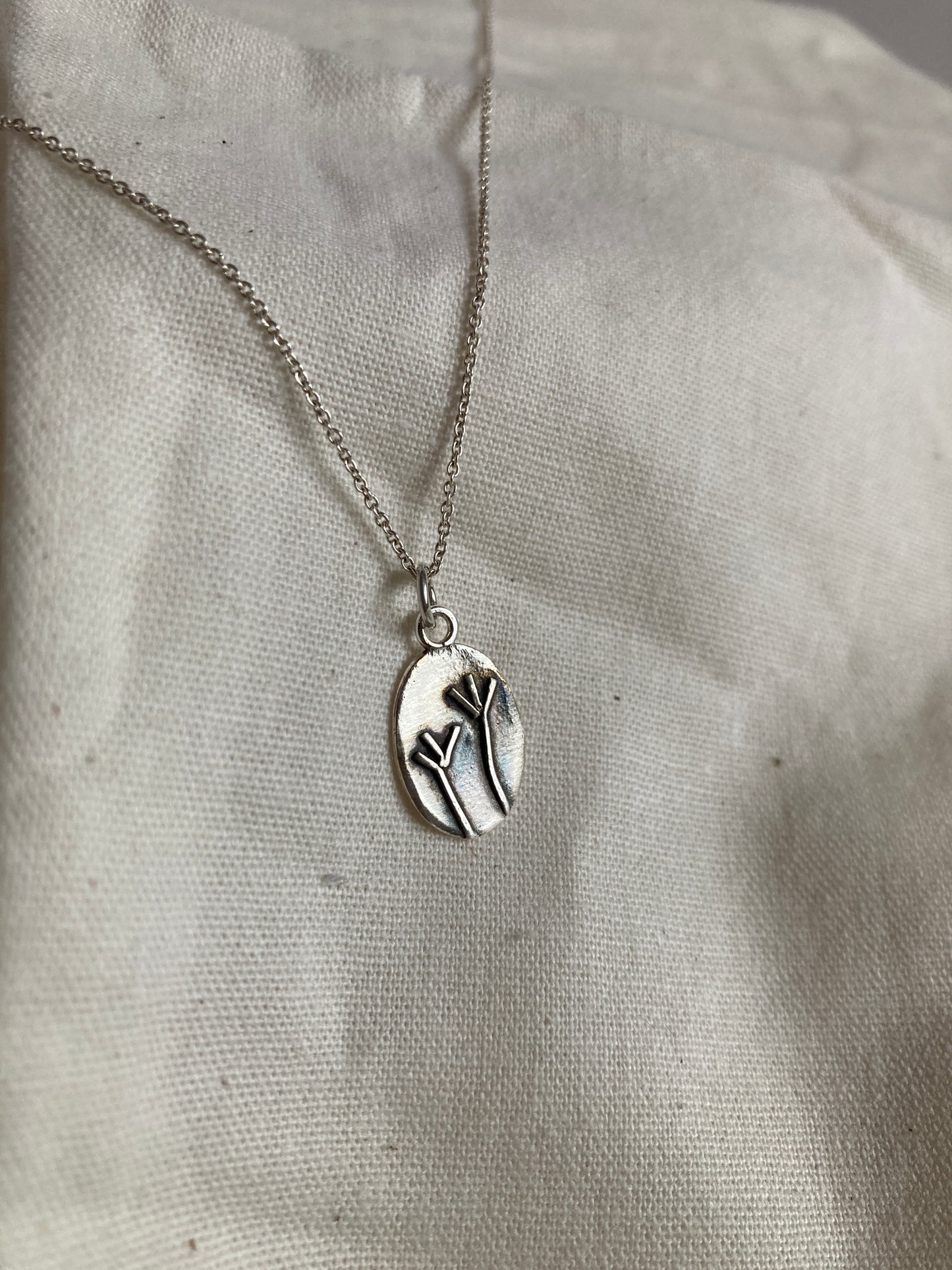 Sterling Silver Oval Pendant with Grass Reed Design on Sterling Silver Chain