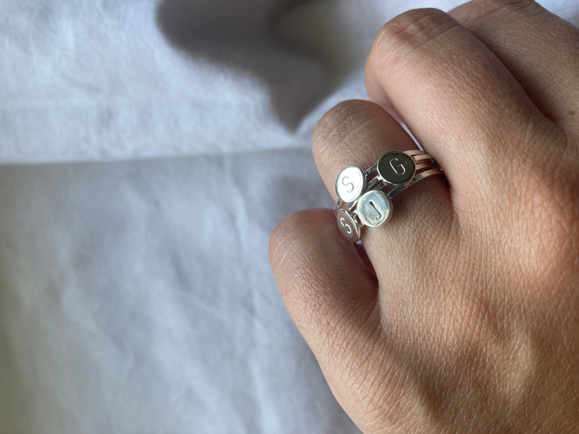 Sterling Silver Initial Disc Rings stacked together