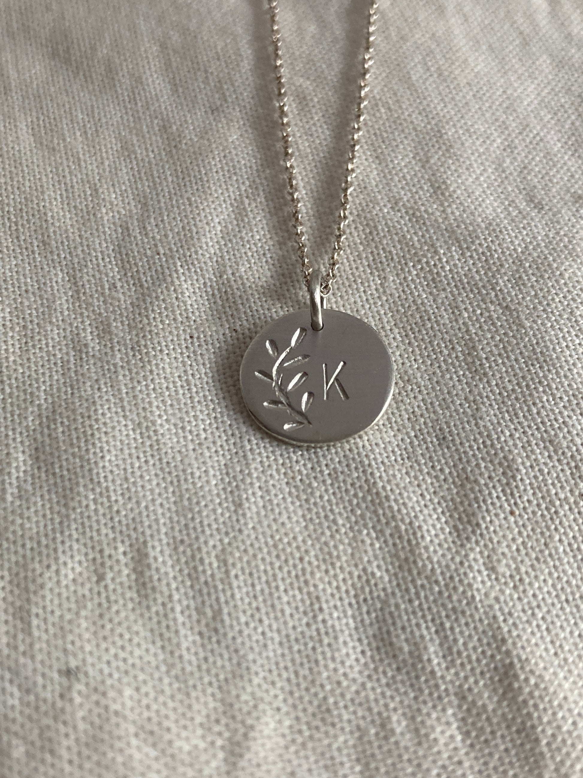 Sterling Silver Disc with Leaves Engraving and hand stamped Initial on Sterling Silver Chain