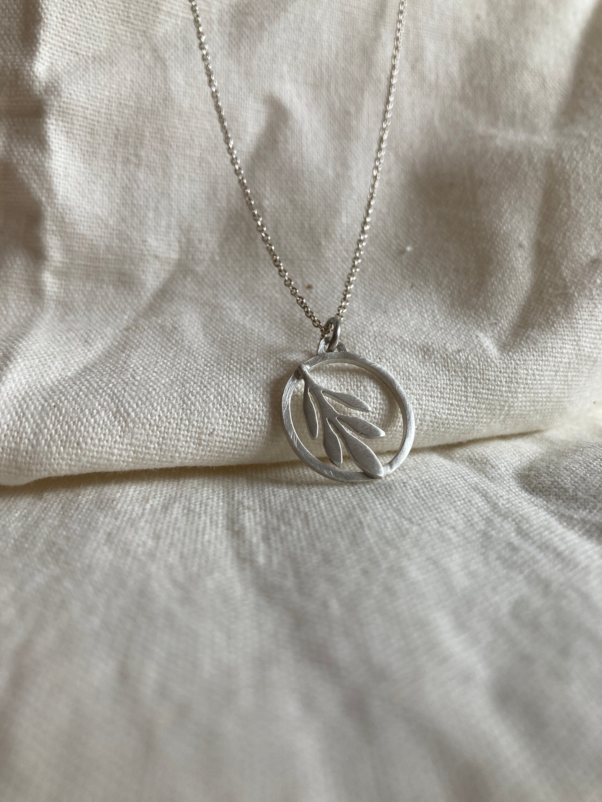 Sterling Silver Circle with Olive Leaves Pendant