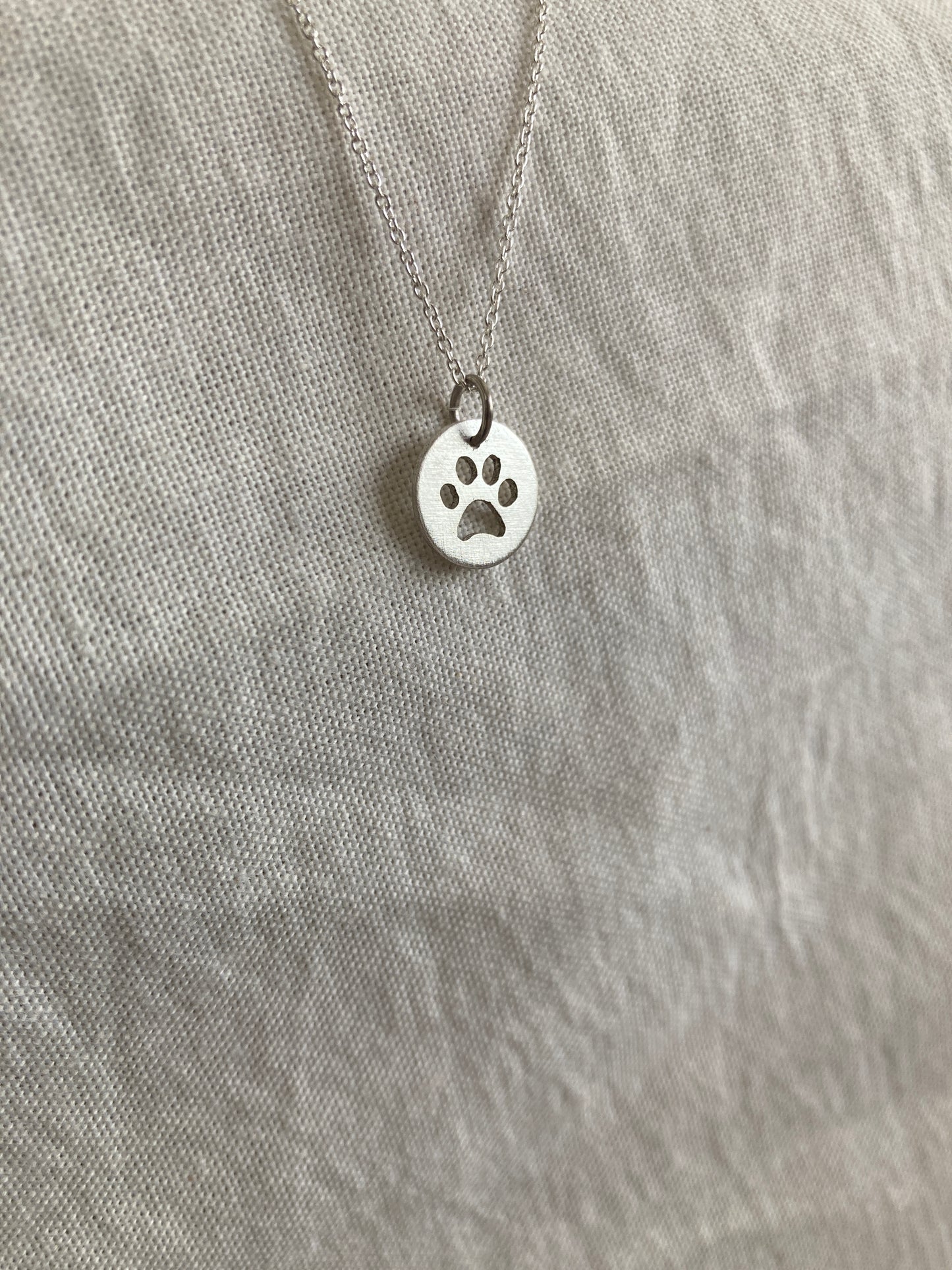 Sterling Silver Disc Pendant with Paw Print cut out