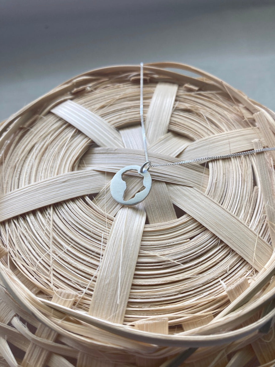 Sterling Silver Disc with Africa cut-out Pendant