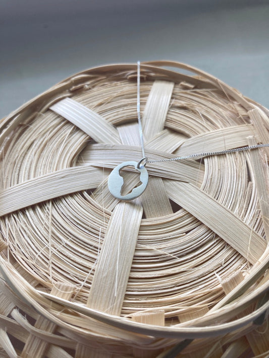 Sterling Silver Disc with Africa cut-out Pendant