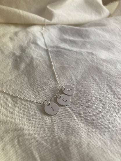 Sterling Silver 9mm Initial Disc Pendant with two additional Initial Disc Charms