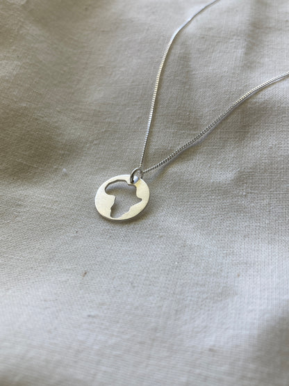 Sterling Silver Disc with Africa cut-out on Sterling Silver Chain