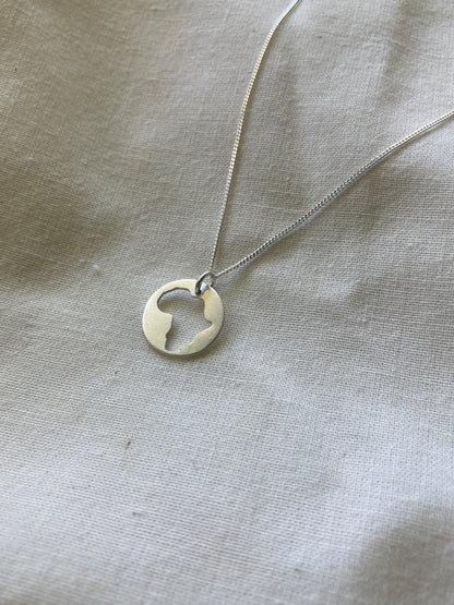 Sterling Silver Disc Pendant with cut-out Africa