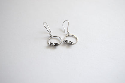 Sterling Silver Circle with two small Blooming Flowers on Silver Hook Earrings