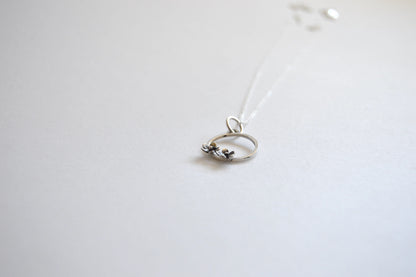 Sterling Silver Circle with two small Blooming Flowers Pendant on Silver Chain