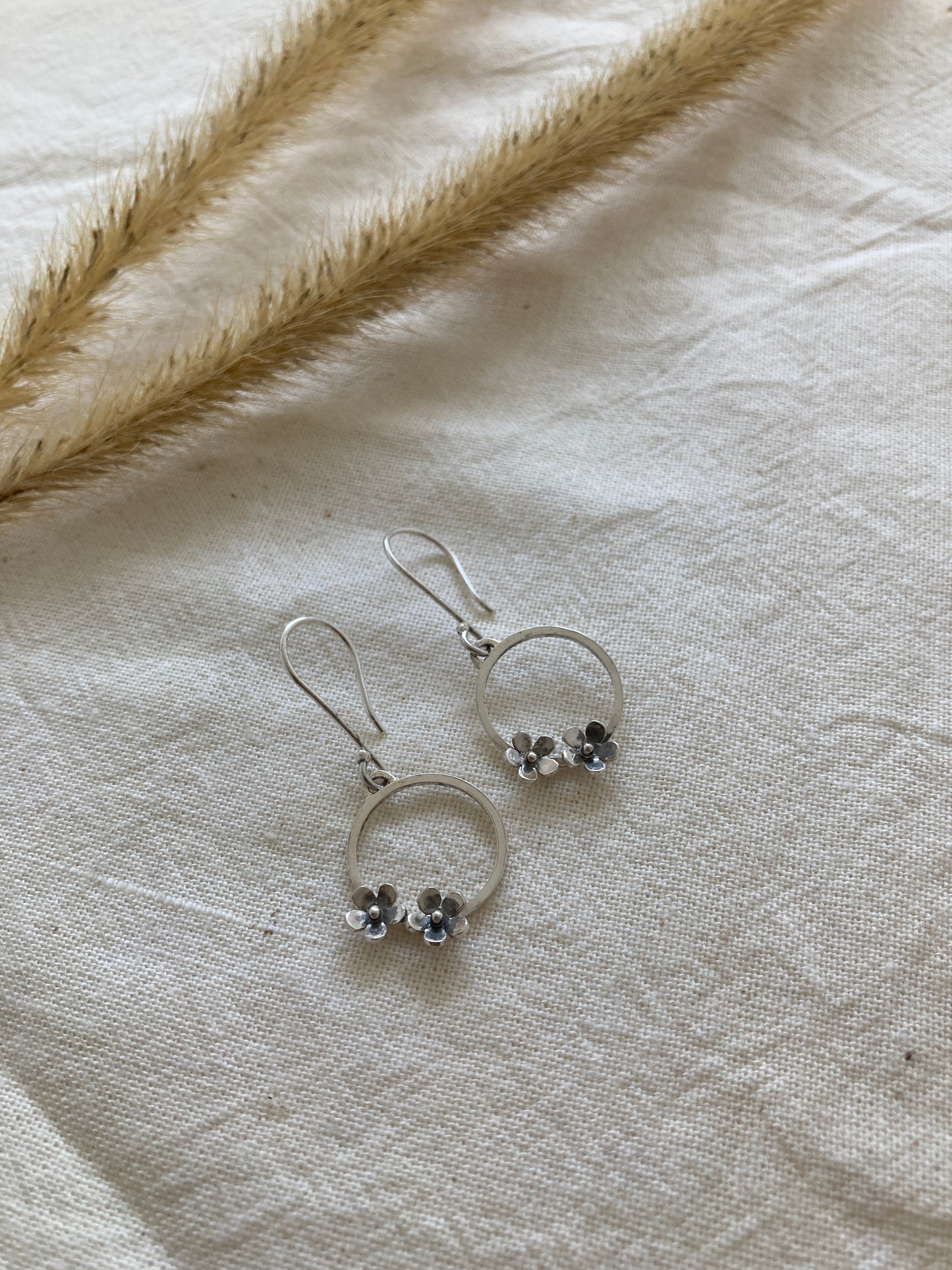 Sterling Silver Circle with two small Blooming Flowers on Silver Hook Earrings