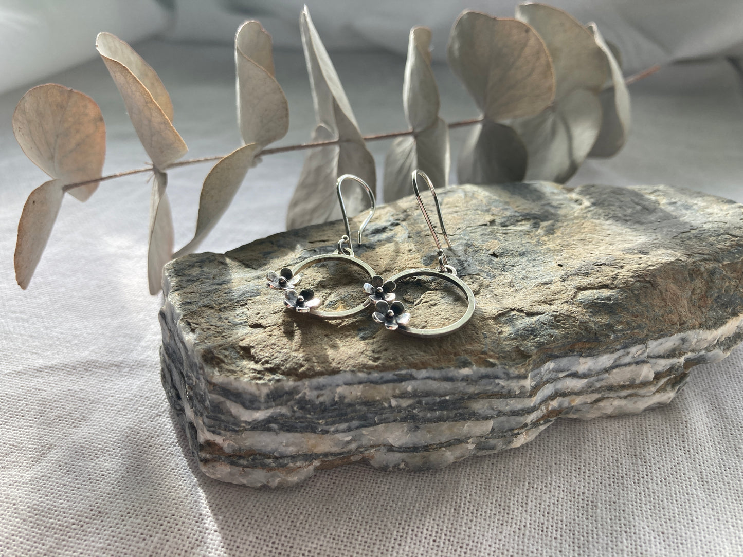 Sterling Silver Circle with two small Blooming Flowers on Silver Hook Earrings