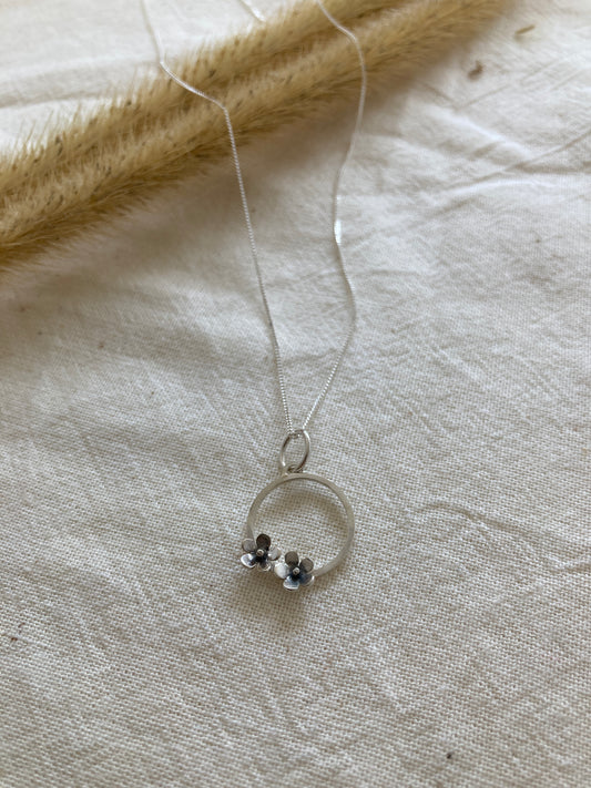 Sterling Silver Circle with two small Blooming Flowers Pendant on Silver Chain