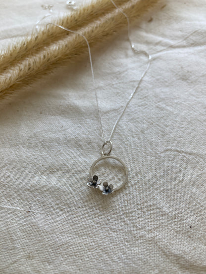 Sterling Silver Circle with two small Blooming Flowers Pendant on Silver Chain