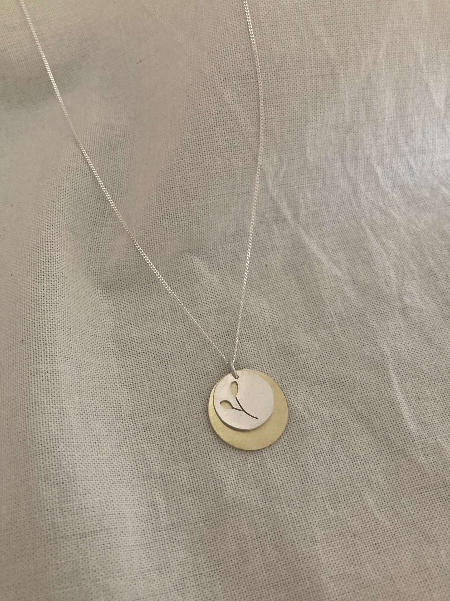 Sterling Silver Disc with Botanical cut-out and Brass Disc Pendant Set