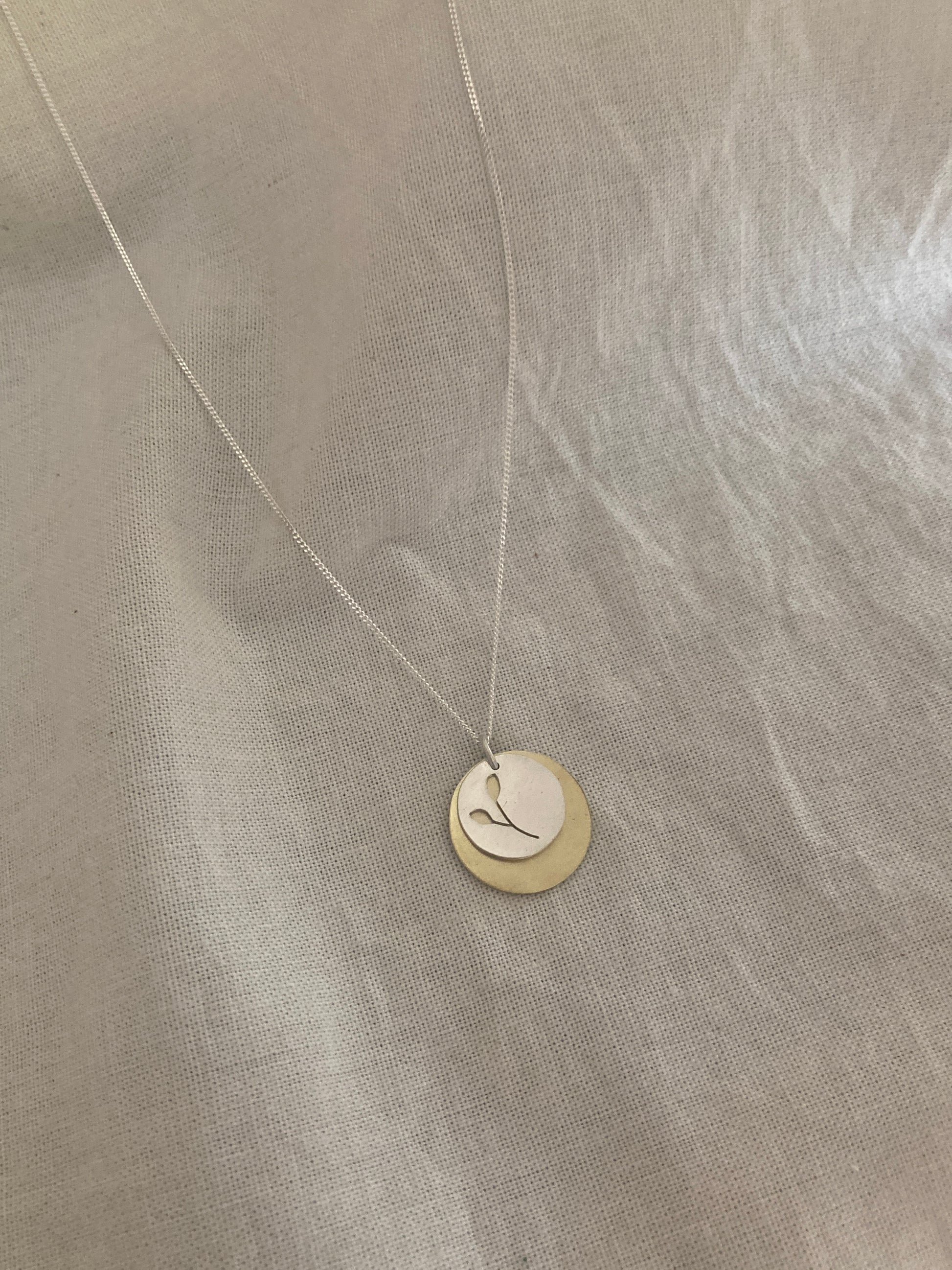 Sterling Silver Disc with Botanical cut-out and Brass Disc Pendant Set