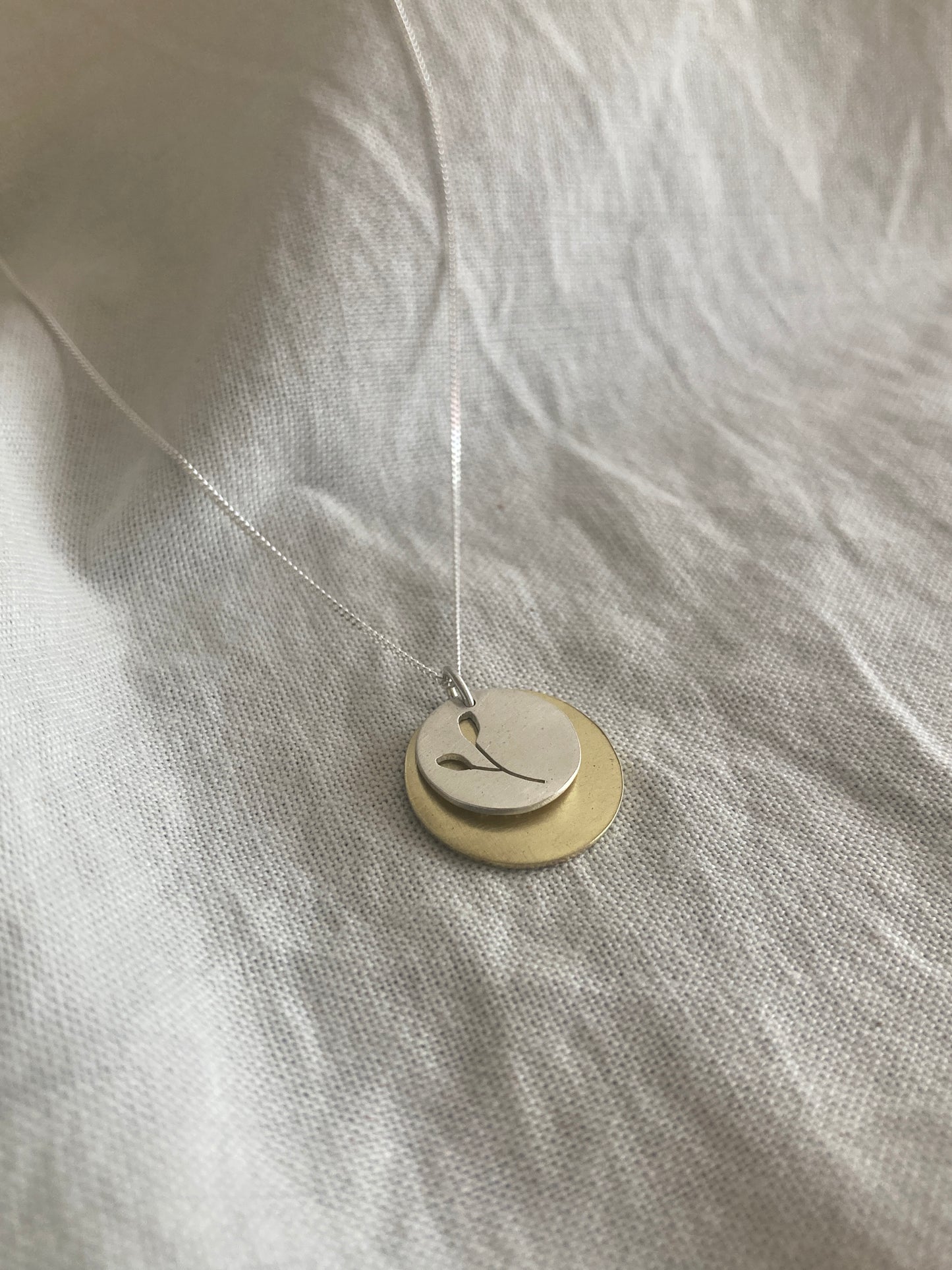 Sterling Silver Disc with Botanical cut-out and Brass Disc Pendant Set