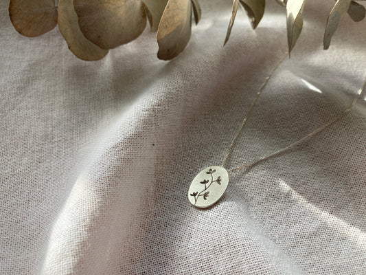 Sterling Silver Oval Pendant with Botanical cut-out inspired by flowers in Bloom on Silver Chain