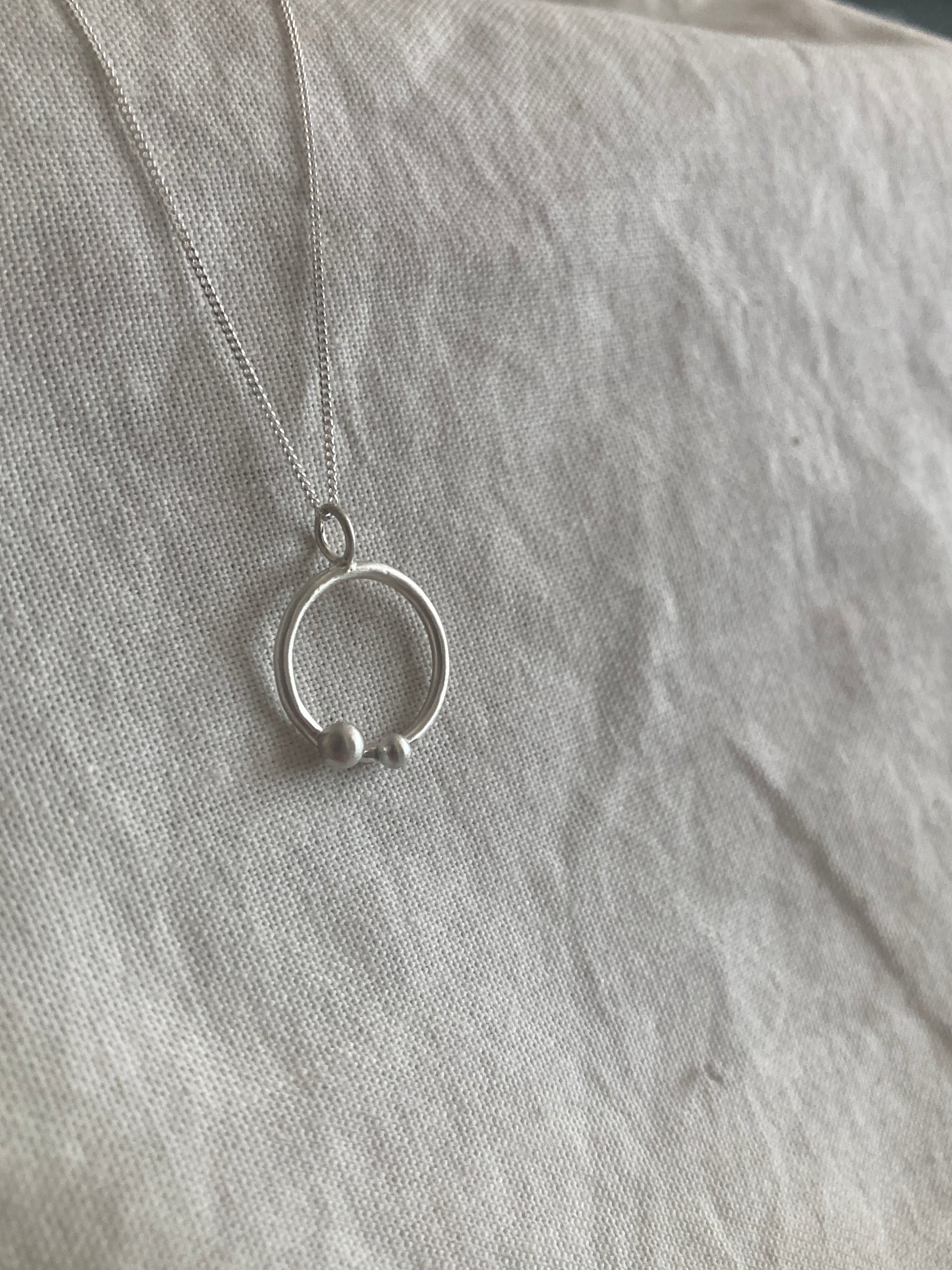 Sterling Silver Circle Pendant with Two Silver Balls on Sterling Silver Chain