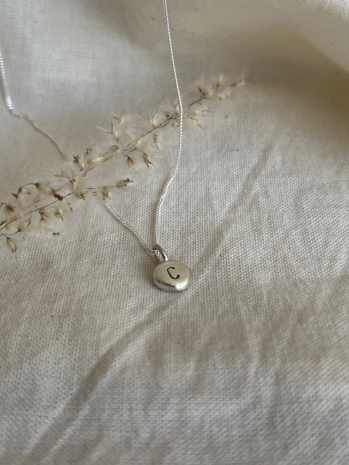 Sterling Silver Initial Pebble Pendant on Silver Chain