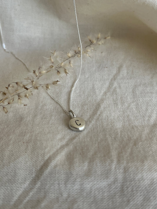 Sterling Silver Initial Pebble Pendant on Silver Chain