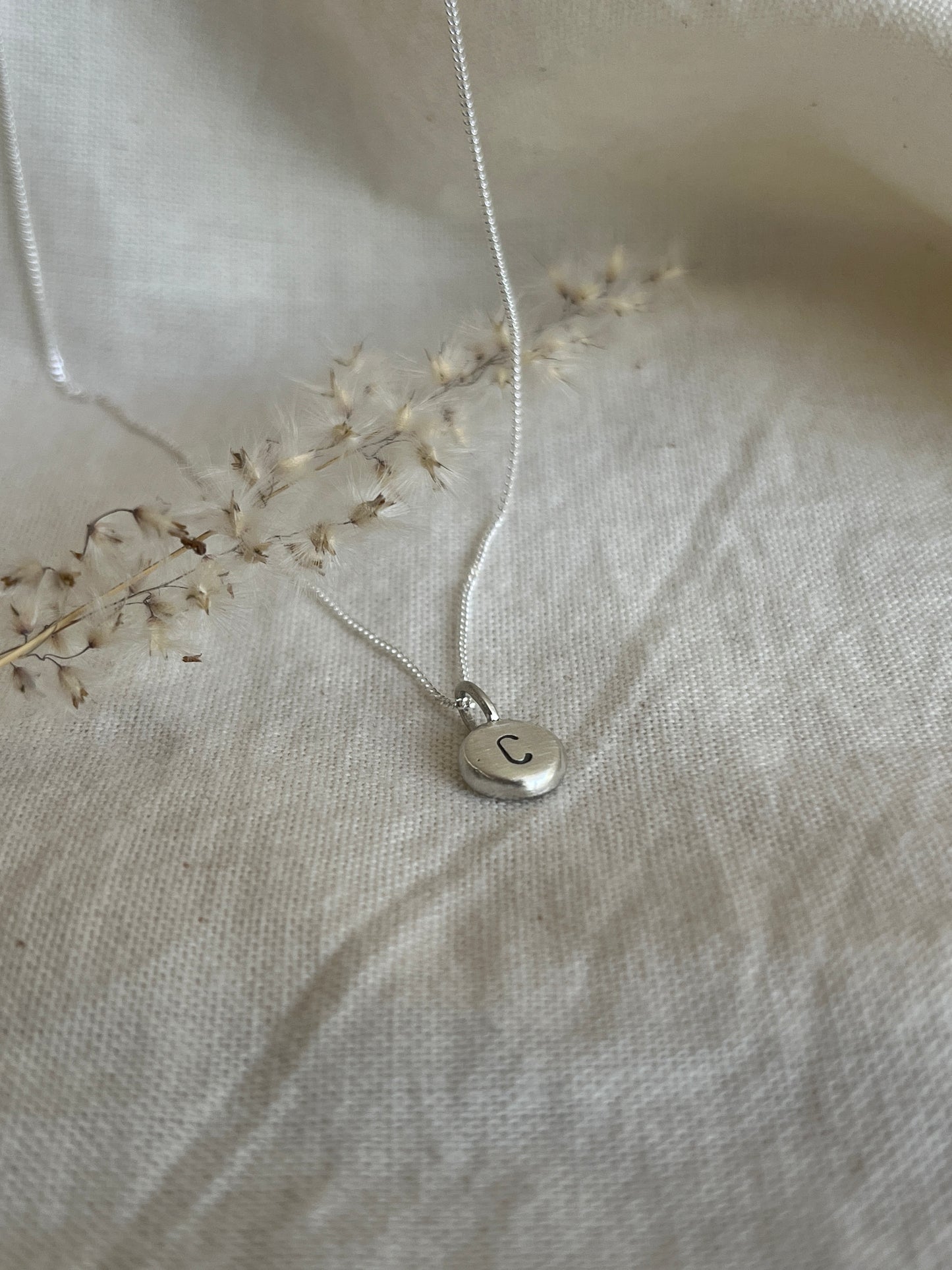 Sterling Silver Initial Pebble Pendant on Silver Chain