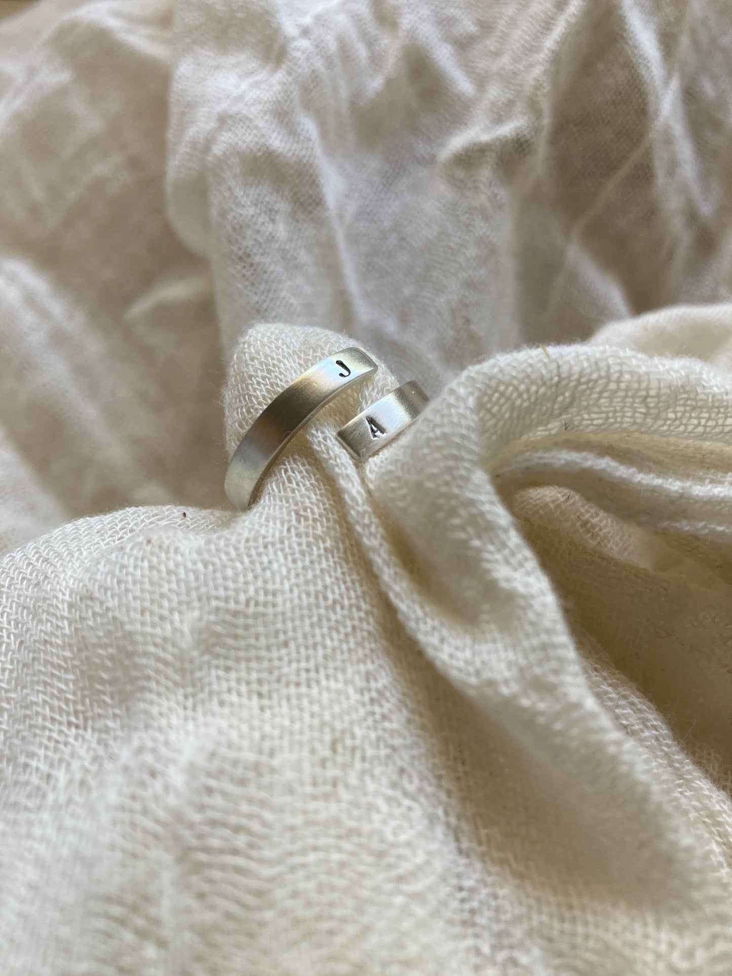 Sterling Silver Open Initial Wrap Ring with hand stamped initials on the ends