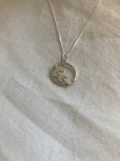 Sterling Silver Circle Pendant with Kiaat Leaf  design on Sterling Silver chain