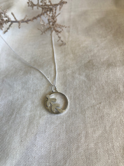 Sterling Silver Circle Pendant with Kiaat Leaf  design on Sterling Silver chain