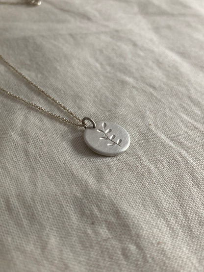 Sterling Silver Disc Pendant with engraved Leaves Design