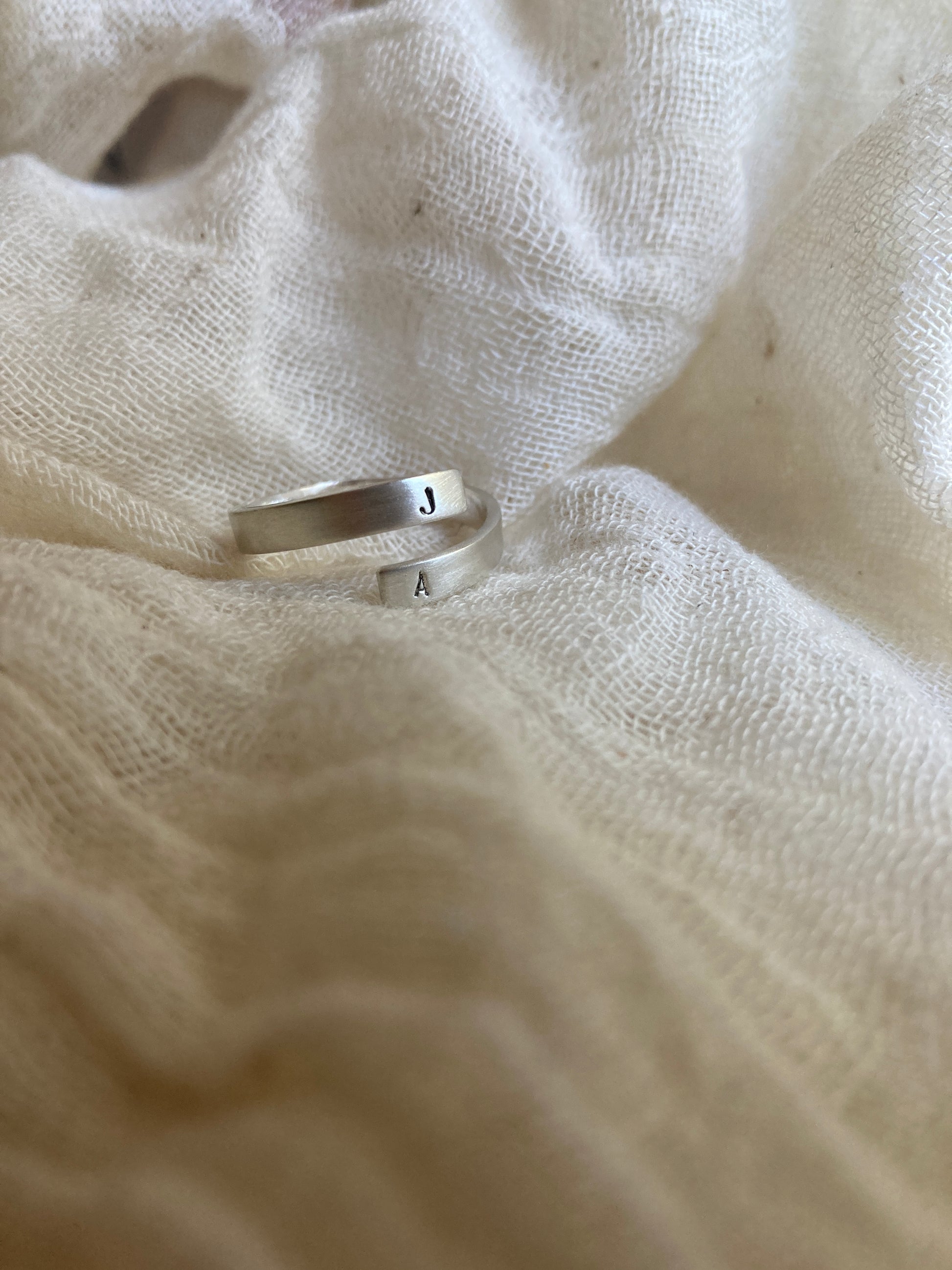 Sterling Silver Open Initial Wrap Ring with hand stamped initials on the ends