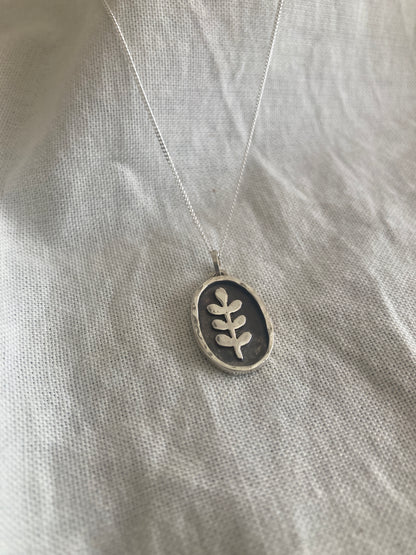Sterling Silver Oval with Leaves Pendant with oxidised detail