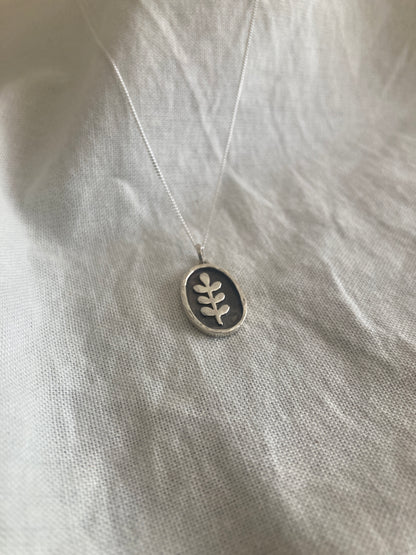 Sterling Silver Oval with Leaves Pendant with oxidised detail