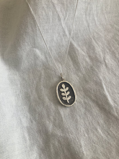Sterling Silver Oval with Leaves Pendant with oxidised detail