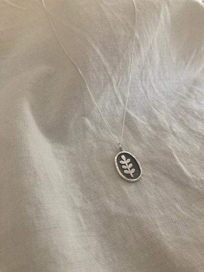 Sterling Silver Oval with Leaves Pendant with oxidised detail