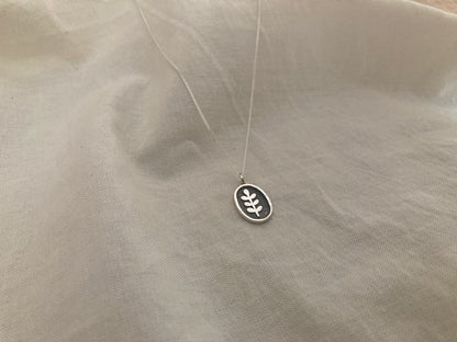 Sterling Silver Oval with Leaves Pendant with oxidised detail