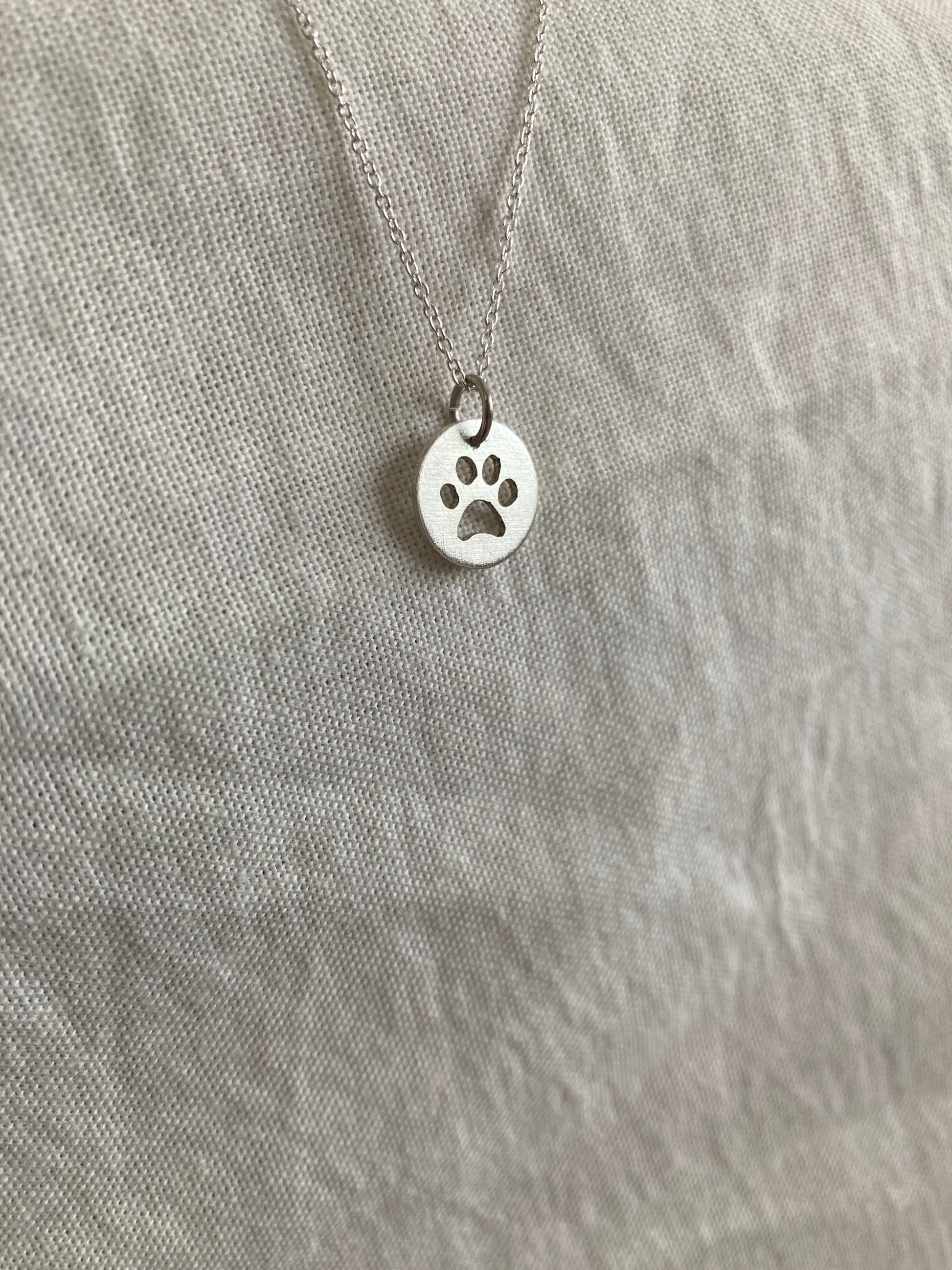 Sterling Silver Disc Pendant with Paw Print cut out