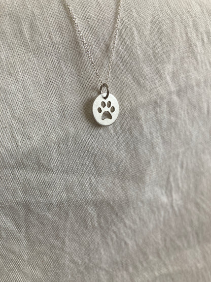 Sterling Silver Disc Pendant with Paw Print cut out
