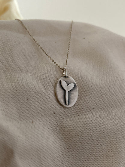 Sterling Silver Oval Pendant with Seedling oxidised design on Sterling Silver Chain