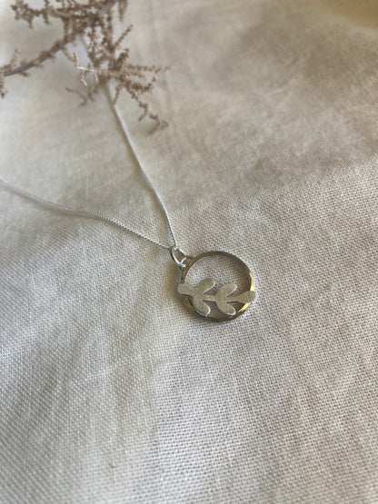 Sterling Silver Circle Pendant with Kiaat Leaf  design on Sterling Silver chain