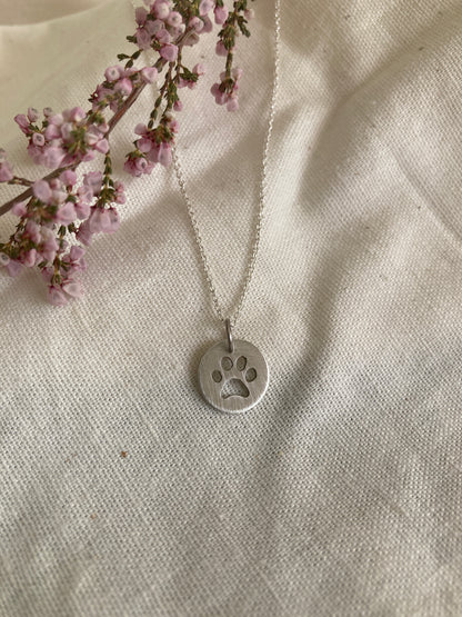 Sterling Silver Disc Pendant with Paw Print cut out